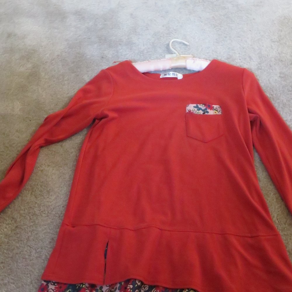 WOMEN'S ORANGE TOP SIZE XL.  LONG SLEEVES